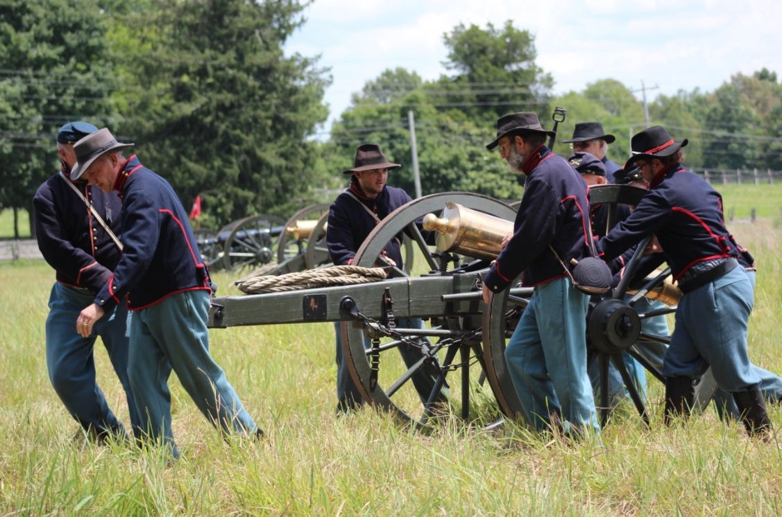 Moving six pdr by hand.jpeg